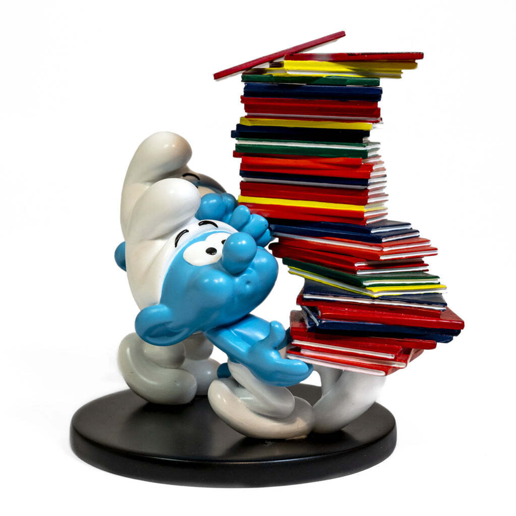 Pilha de álbuns de figurinhas dos Smurfs Plastoy