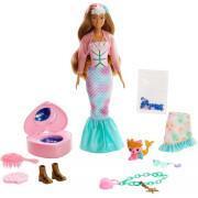Boneca + 25 surpresas Barbie